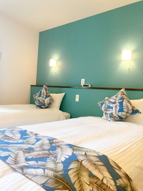 Basic Twin Room, 2 Twin Beds | Blackout drapes, iron/ironing board, free WiFi, bed sheets