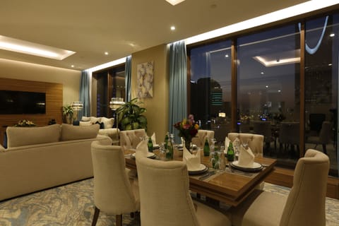 Royal Suite, 2 Bedrooms | Living area | 42-inch Smart TV with premium channels, TV