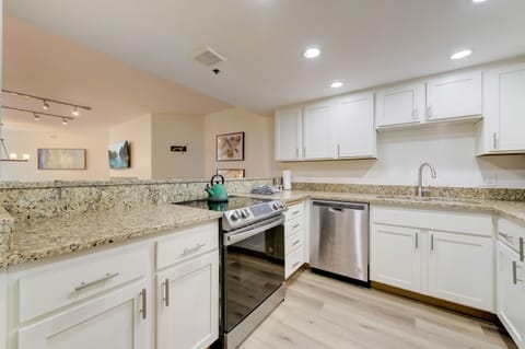 2-Bedroom Condominium | Private kitchen | Full-size fridge, microwave, oven, stovetop
