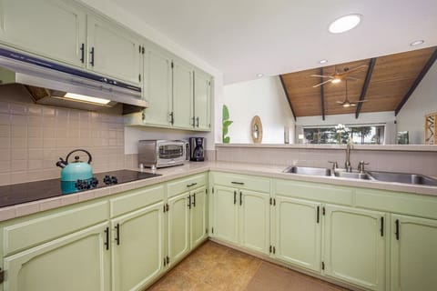 The full kitchen is complete with a stove, oven, dishwasher and full-sized refrigerator as well as several small appliances for your convenience.