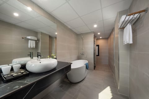 Suite, Balcony, City View | Bathroom | Free toiletries, hair dryer, bathrobes, slippers