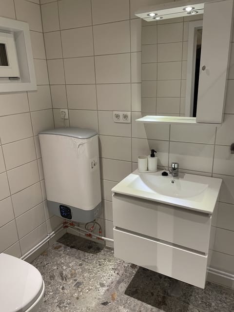 Shower, bathrobes, towels