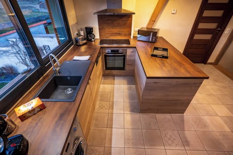 Deluxe Apartment | Private kitchen | Fridge, microwave, espresso maker, coffee/tea maker