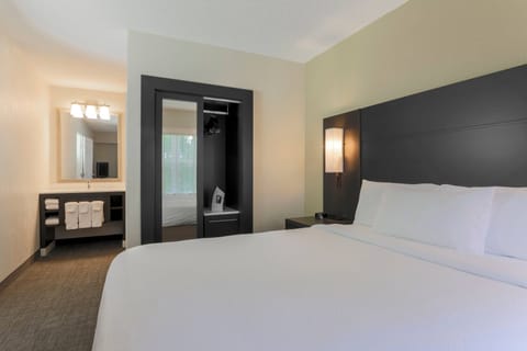 Suite, 2 Bedrooms, Fireplace | In-room safe, desk, blackout drapes, iron/ironing board