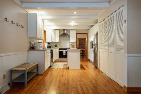 Back Inside. Wall Hooks & Bench inside Entry Door