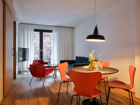 Two Bedroom Apartment | Living area | 55-inch TV with cable channels