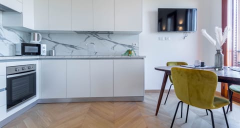 Apartment | Private kitchen | Electric kettle, dining tables