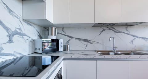 Apartment | Private kitchen | Electric kettle, dining tables