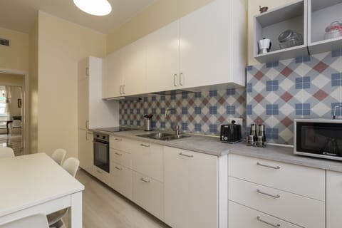 Classic Apartment | Private kitchen | Fridge, microwave, oven, stovetop