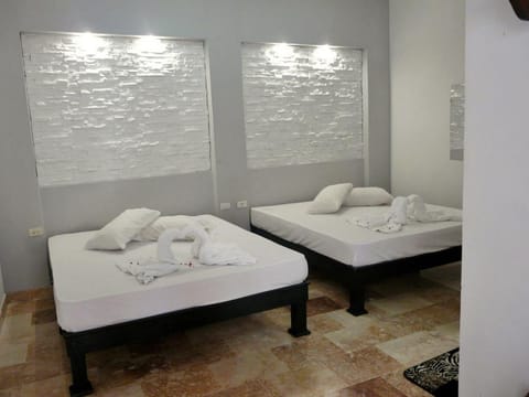 Comfort Quadruple Room | Minibar, individually decorated, individually furnished, blackout drapes