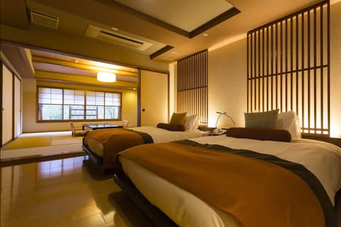 Japanese-Western Style Room with Open-air Bath, Half Board | Down comforters, in-room safe, free WiFi, bed sheets