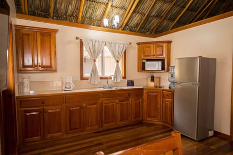 Junior Cottage | Private kitchen | Full-size fridge, microwave, stovetop, coffee/tea maker