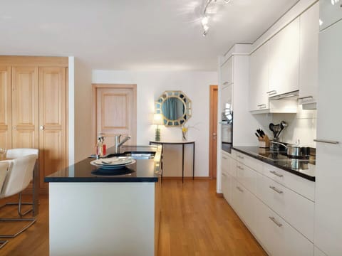 Furniture, Countertop, Cabinetry, Kitchen, Interior Design, Flooring, Kitchen Appliance, Wood, Floor, Home