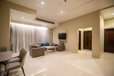 Traditional Apartment | Living area | 50-inch Smart TV with cable channels, printers