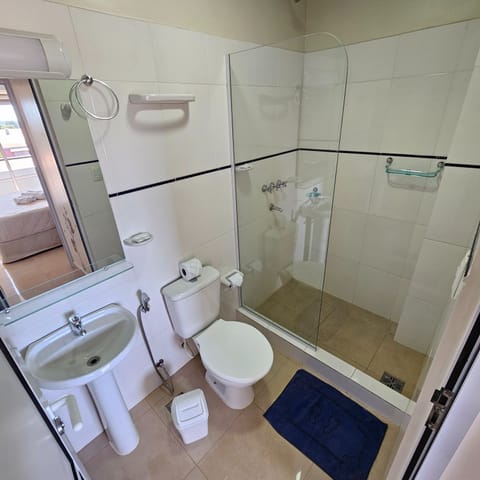 Classic Room | Bathroom | Rainfall showerhead, electronic bidet, towels, soap