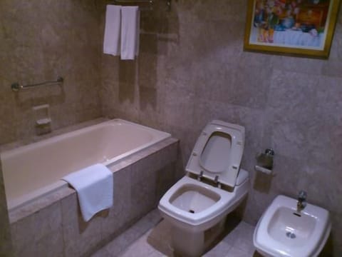 Standard Suite, 1 Bedroom | Bathroom | Separate tub and shower, deep soaking tub, free toiletries, hair dryer