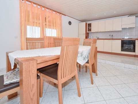 Furniture, Building, Table, Wood, Chair, Interior Design, Cabinetry, Wood Stain, Window, Flooring