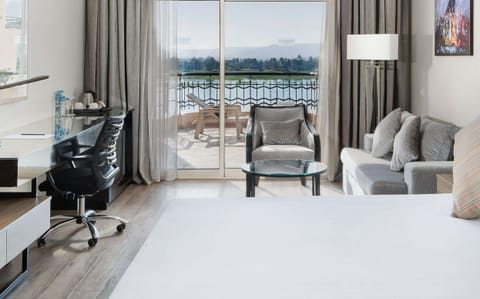 Executive Room, View (Superior, Front Nile View) | Minibar, in-room safe, desk, blackout drapes