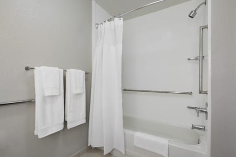 Room, 1 King Bed (Mobility/Hearing Accessible, Tub) | Bathroom | Combined shower/tub, free toiletries, hair dryer, towels