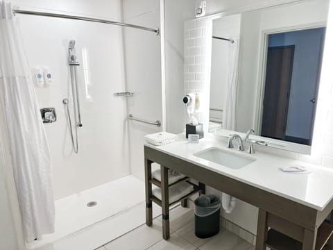 Room, 1 King Bed, Accessible, Non Smoking (Roll-In Shower) | Bathroom | Combined shower/tub, free toiletries, hair dryer, towels