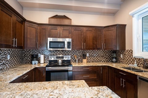 Apartment | Private kitchen | Full-size fridge, microwave, oven, stovetop