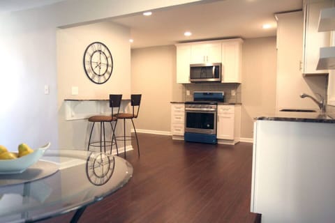 Large eat in kitchen. Gas range and lots of space. Here for a while? Get your cooking on!