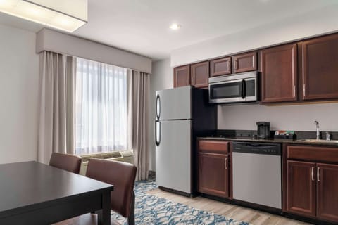 Suite, 1 Queen Bed, Non Smoking | Private kitchen | Fridge, microwave, stovetop, dishwasher