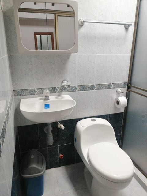 Economy Single Room, 1 Double Bed | Bathroom | Shower, towels