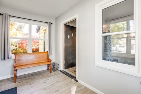 The front entry area leads into the living room.