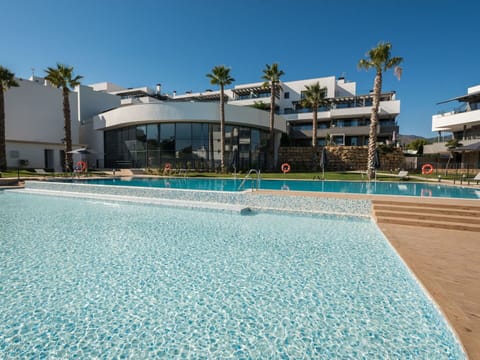 Sky, Water, Building, Azure, Plant, Swimming Pool, Tree, Leisure, Aqua, Arecales