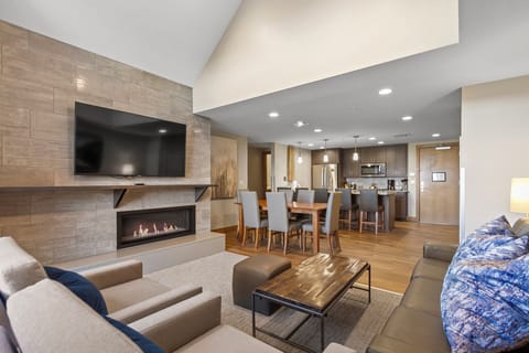 Living room with view to kitchen