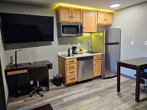 Suite, 1 King Bed, Non Smoking, Kitchen | Living room | LED TV