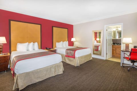 Deluxe Room, Multiple Beds, Non Smoking | In-room safe, blackout drapes, soundproofing, iron/ironing board