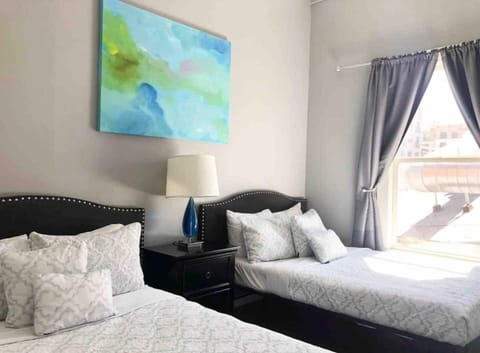 Bedroom No. 2: There are (2) Double beds with all pillows, linens and blankets