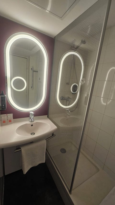 Eco-friendly toiletries, hair dryer, towels