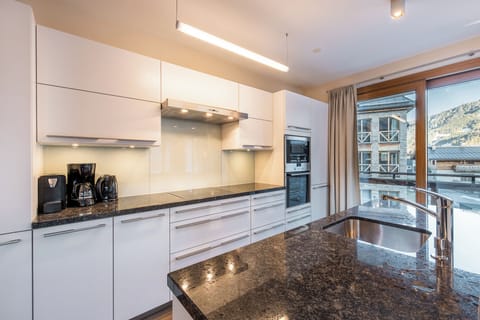 Three-Bedroom Apartment Type 3A | Private kitchen | Espresso maker, coffee/tea maker, highchair, dining tables