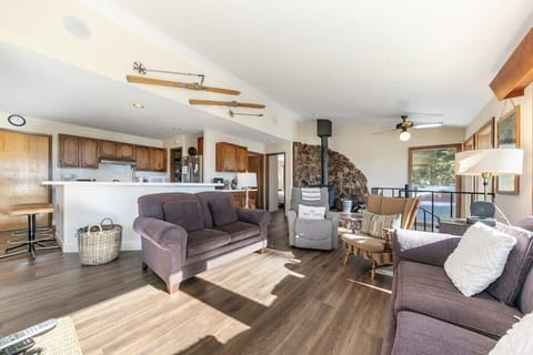 An open-layout living/kitchen/dining room makes it easy to stay connected with your group during your stay.