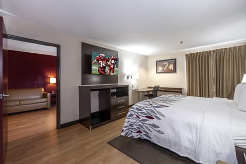 Suite, 1 King Bed (Smoke Free) | Desk, iron/ironing board, free cribs/infant beds, free WiFi