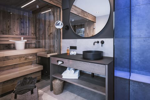 Design Studio Suite | Bathroom | Separate tub and shower, rainfall showerhead, hair dryer, bathrobes