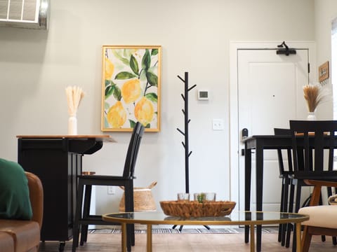 Enjoy meals together sitting up at chic cafe- style dining table.