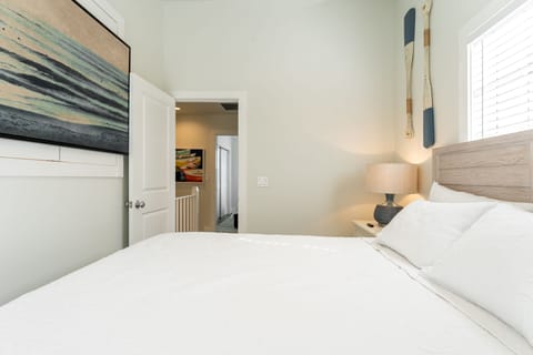 Bedroom 2 features a queen bed.