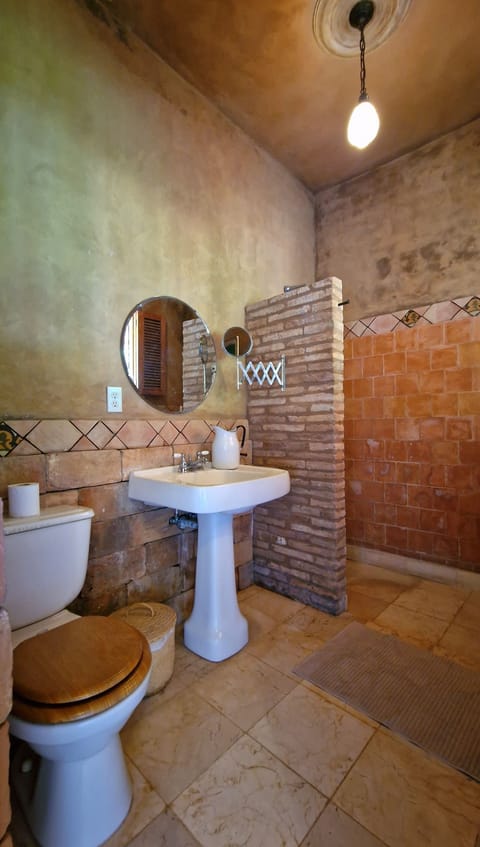 Superior Room | Bathroom | Rainfall showerhead, heated floors, towels, soap