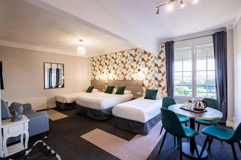 Family Room, Multiple Beds, Non Smoking | In-room safe, desk, iron/ironing board, free WiFi