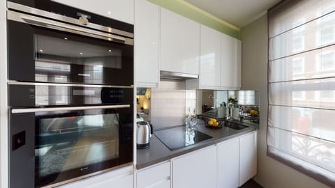 Executive Apartment, 1 Bedroom | Private kitchen | Full-size fridge, dining tables