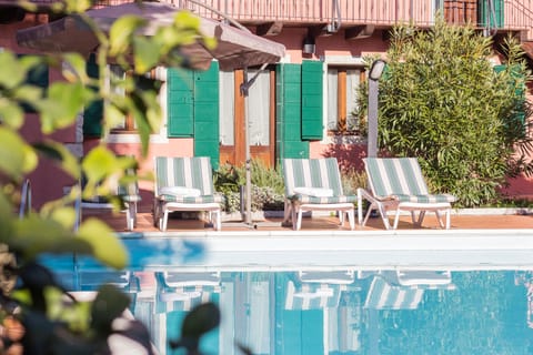 Seasonal outdoor pool, sun loungers