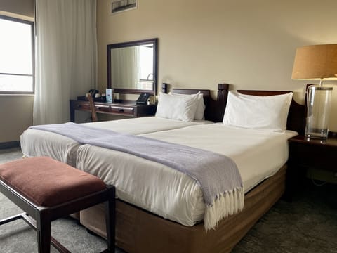 Deluxe Twin Room, 2 Twin Beds, Non Smoking, City View | In-room safe, individually decorated, individually furnished