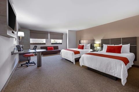 Suite, 2 Double Beds, Non Smoking | In-room safe, desk, laptop workspace, blackout drapes