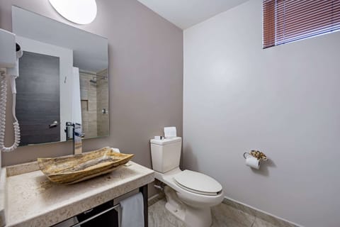 Suite, 2 Double Beds, Non Smoking | Bathroom | Shower, hair dryer, towels