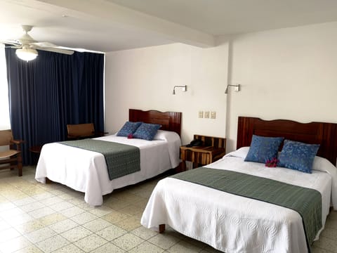 Standard Room, 2 Double Beds, Ocean View | Premium bedding, in-room safe, desk, iron/ironing board
