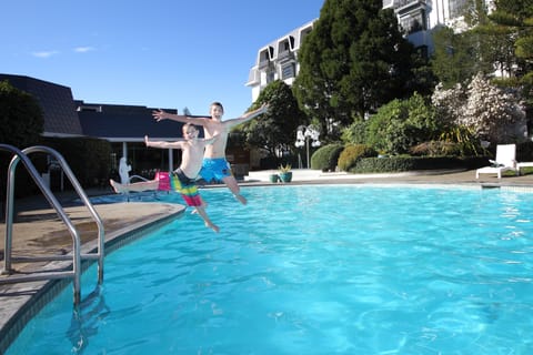 Outdoor pool, pool umbrellas, sun loungers